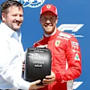 Vettel (GER) Ferrari receives the Pirelli Pole Position award from Paul Hembery (GBR) Pirelli Motorsport Director at Formula One World Championship, Rd7, Canadian Grand Prix, Qualifying, Montreal, Canada, Saturday 9 June 2018. © Glenn Dunbar/Sutton Images