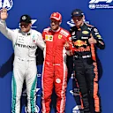 (L to R): Valtteri Bottas (FIN) Mercedes-AMG F1, Sebastian Vettel (GER) Ferrari and Max Verstappen (NED) Red Bull Racing celebrate in parc ferme at Formula One World Championship, Rd7, Canadian Grand Prix, Qualifying, Montreal, Canada, Saturday 9 June 2018. © Jerry Andre/Sutton Images