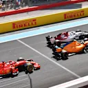 Marcus Ericsson (SWE) Alfa Romeo Sauber C37, Stoffel Vandoorne (BEL) McLaren MCL33 and Sebastian Vettel (GER) Ferrari SF-71H battle at Formula One World Championship, Rd8, French Grand Prix, Race, Paul Ricard, France, Sunday 24 June 2018. © Jerry Andre/Sutton Images
