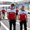 Charles Leclerc (MON) Alfa Romeo Sauber F1 Team walks the track with Xevi Pujolar (ESP) Alfa Romeo Sauber F1 Team Head of Track Engineering and Ruth Buscombe (GBR) Alfa Romeo Sauber F1 Team Race Strategist at Formula One World Championship, Rd8, French Gr