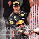 Race winner Daniel Ricciardo (AUS) Red Bull Racing celebrates on the podium with Lewis Hamilton (GBR) Mercedes-AMG F1 and the champagne at Formula One World Championship, Rd6, Monaco Grand Prix, Race, Monte-Carlo, Monaco, Sunday 27 May 2018. © Mark Sutton/Sutton Images