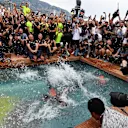 Daniel Ricciardo (AUS) Red Bull Racing celebrates in the Red Bull Energy Station swimming pool at Formula One World Championship, Rd6, Monaco Grand Prix, Race, Monte-Carlo, Monaco, Sunday 27 May 2018. © Mark Sutton/Sutton Images
