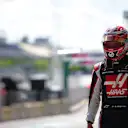 SPIELBERG, AUSTRIA - JULY 04:  Kevin Magnussen of Denmark and Haas F1 walks through the pit lane during qualifying for the Formula One Grand Prix of Austria at Red Bull Ring on July 04, 2020 in Spielberg, Austria. (Photo by Peter Fox/Getty Images)