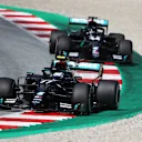 SPIELBERG, AUSTRIA - JULY 05: Valtteri Bottas of Finland driving the (77) Mercedes AMG Petronas F1 Team Mercedes W11 leads Lewis Hamilton of Great Britain driving the (44) Mercedes AMG Petronas F1 Team Mercedes W11 during the Formula One Grand Prix of Austria at Red Bull Ring on July 05, 2020 in Spielberg, Austria. (Photo by Bryn Lennon/Getty Images)