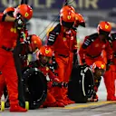 BAHRAIN, BAHRAIN - MARCH 05: The Ferrari team prepare for a pitstop during the F1 Grand Prix of Bahrain at Bahrain International Circuit on March 05, 2023 in Bahrain, Bahrain. (Photo by Mark Thompson/Getty Images)