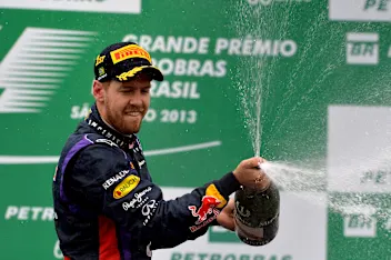 Race winner Sebastian Vettel (GER) Red Bull Racing celebrates on the podium with the