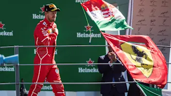 Sebastian Vettel (GER) Ferrari celebrates on the podium at Formula One World Championship, Rd13,