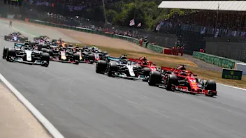 Sebastian Vettel (GER) Ferrari SF-71H leads Lewis Hamilton (GBR) Mercedes-AMG F1 W09 EQ Power+ and