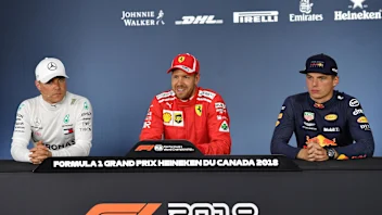 (L to R): Valtteri Bottas (FIN) Mercedes-AMG F1, Sebastian Vettel (GER) Ferrari and Max Verstappen
