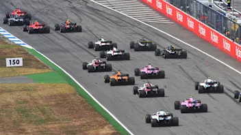 Sebastian Vettel (GER) Ferrari SF-71H leads on lap one at Formula One World Championship, Rd11,