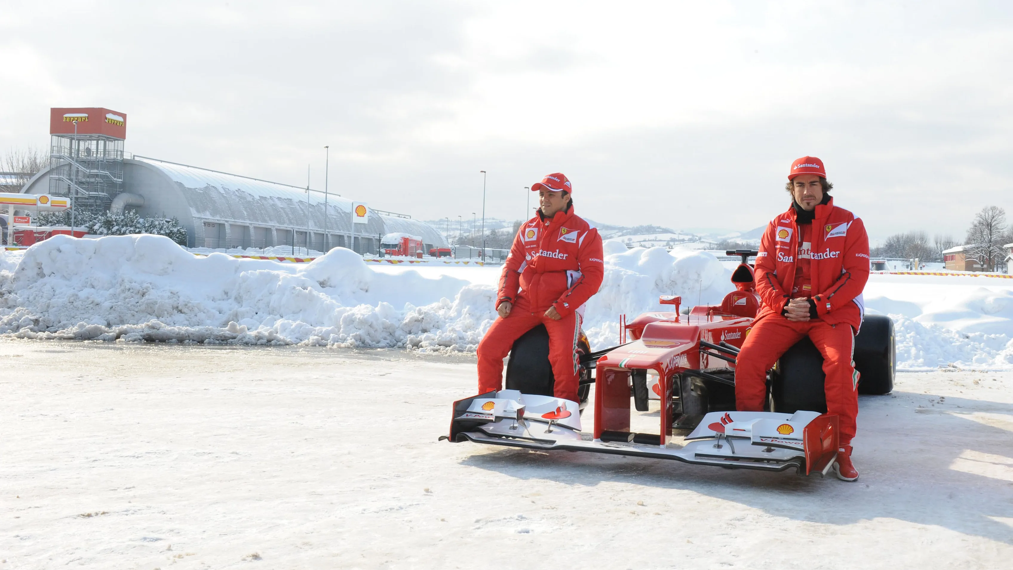 R-L: Fernando Alonso (ESP) and Felipe Massa (BRA) with the Ferrari F2012 in the snow.
Ferrari F2012