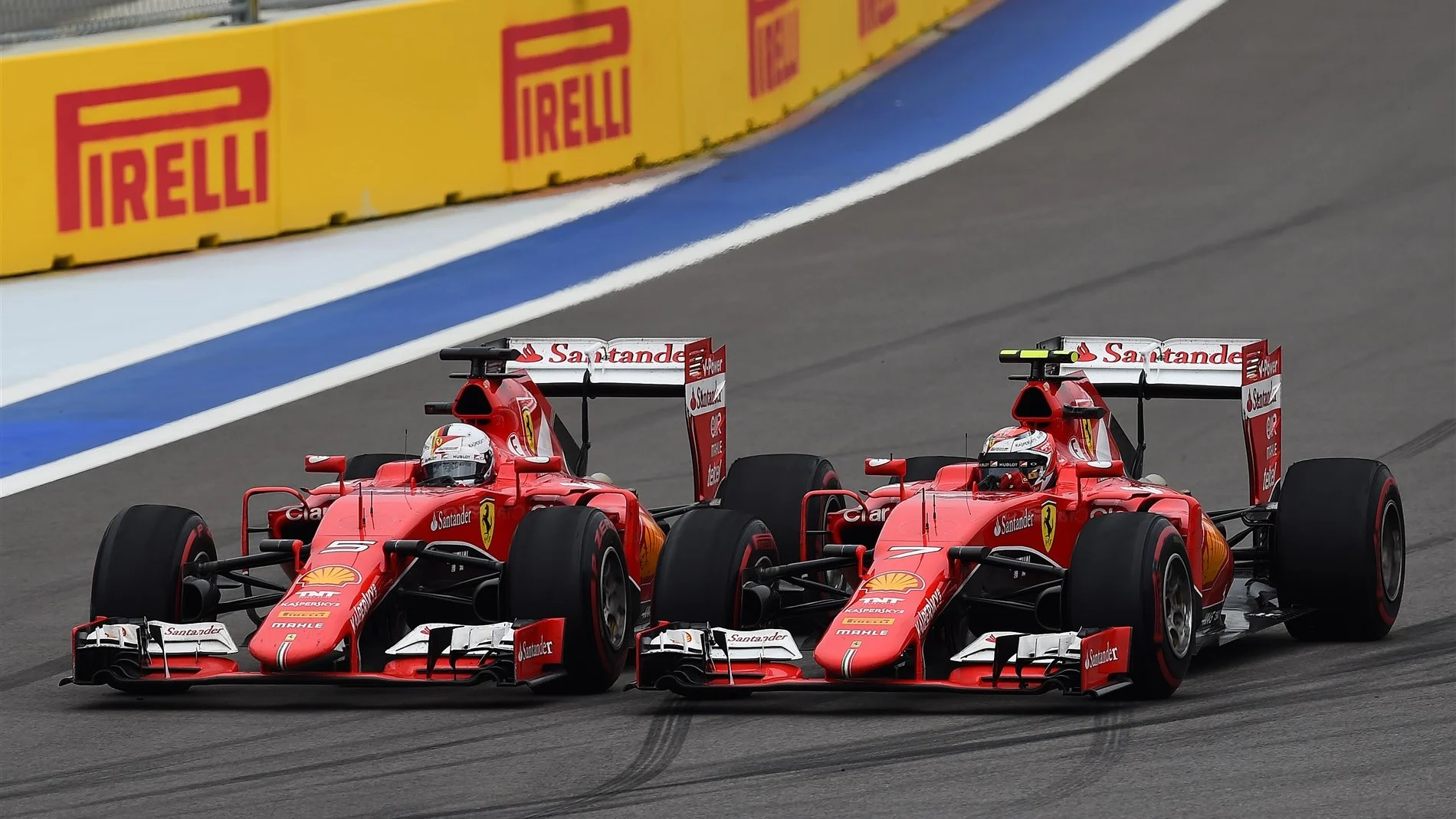 Sebastian Vettel (GER) Ferrari SF15-T and Kimi Raikkonen (FIN) Ferrari SF15-T battle at Formula One World Championship, Rd15, Russian Grand Prix, Race, Sochi Autodrom, Sochi, Krasnodar Krai, Russia, Sunday 11 October 2015. &copy; Sutton Motorsport Images