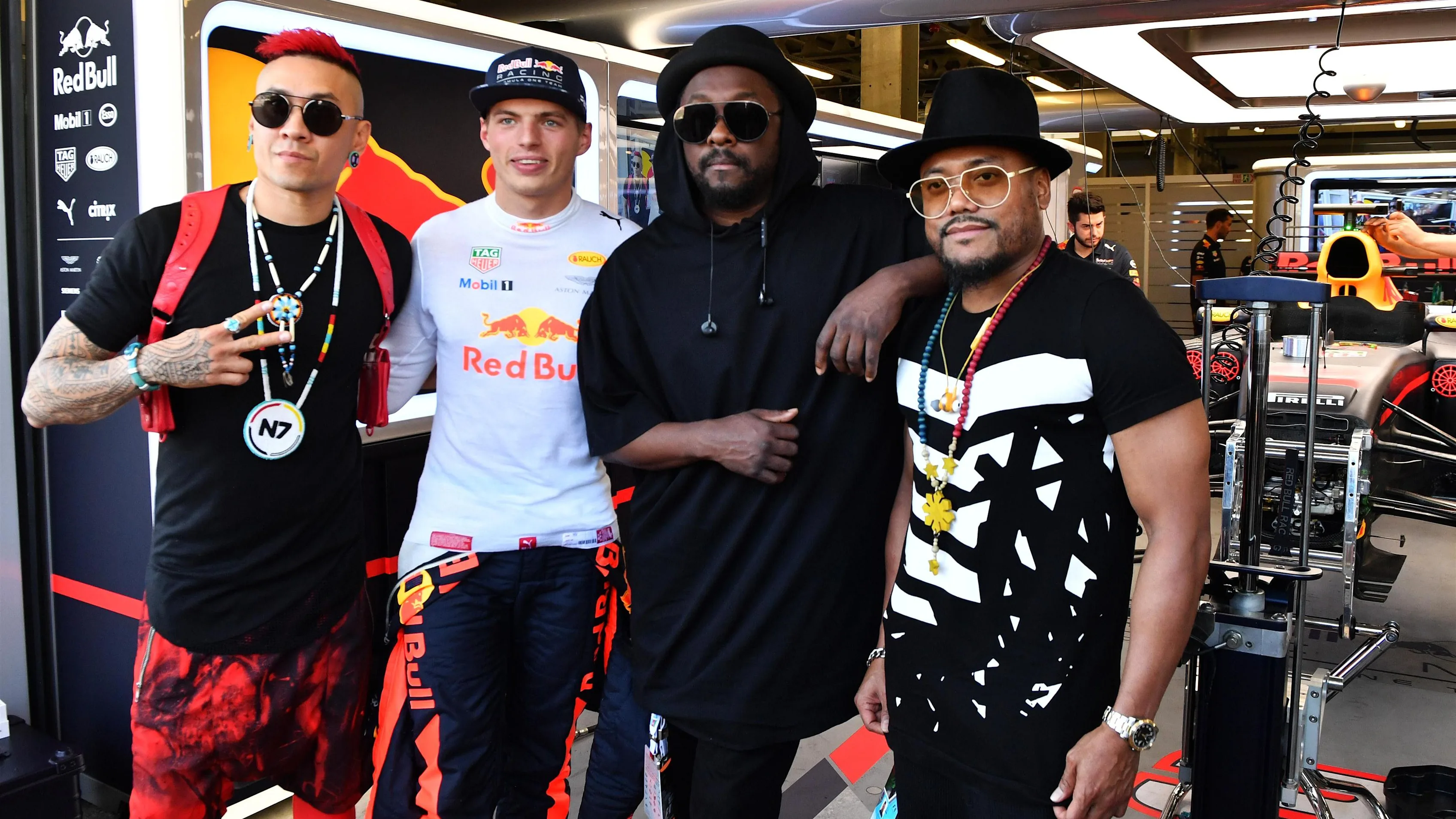 Max Verstappen (NED) Red Bull Racing with William James Adams aka Will.I.Am (USA) Black Eyed Peas Musician, Jaime Luis Gomez aka Taboo (MEX) Black Eyed Peas Musician and Allan Pineda Lindo aka Apl.de.ap (USA) Black Eyed Peas Musician in the Red Bull Racing garage at Formula One World Championship, Rd8, Azerbaijan Grand Prix, Qualifying, Baku City Circuit, Baku, Azerbaijan, Saturday 24 June 2017. © Sutton Images