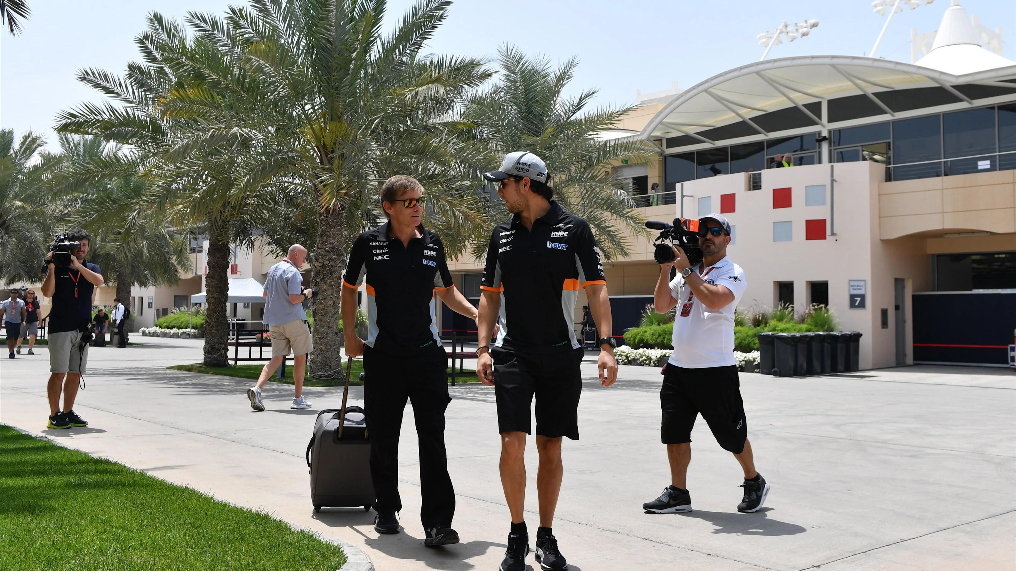 Sergio Perez (MEX) Force India and Xavi Martos (ESP) Trainer at Formula One World Championship, Rd3, Bahrain Grand Prix Preparations, Bahrain International Circuit, Sakhir, Bahrain, Thursday 13 April 2017. © Sutton Motorsport Images