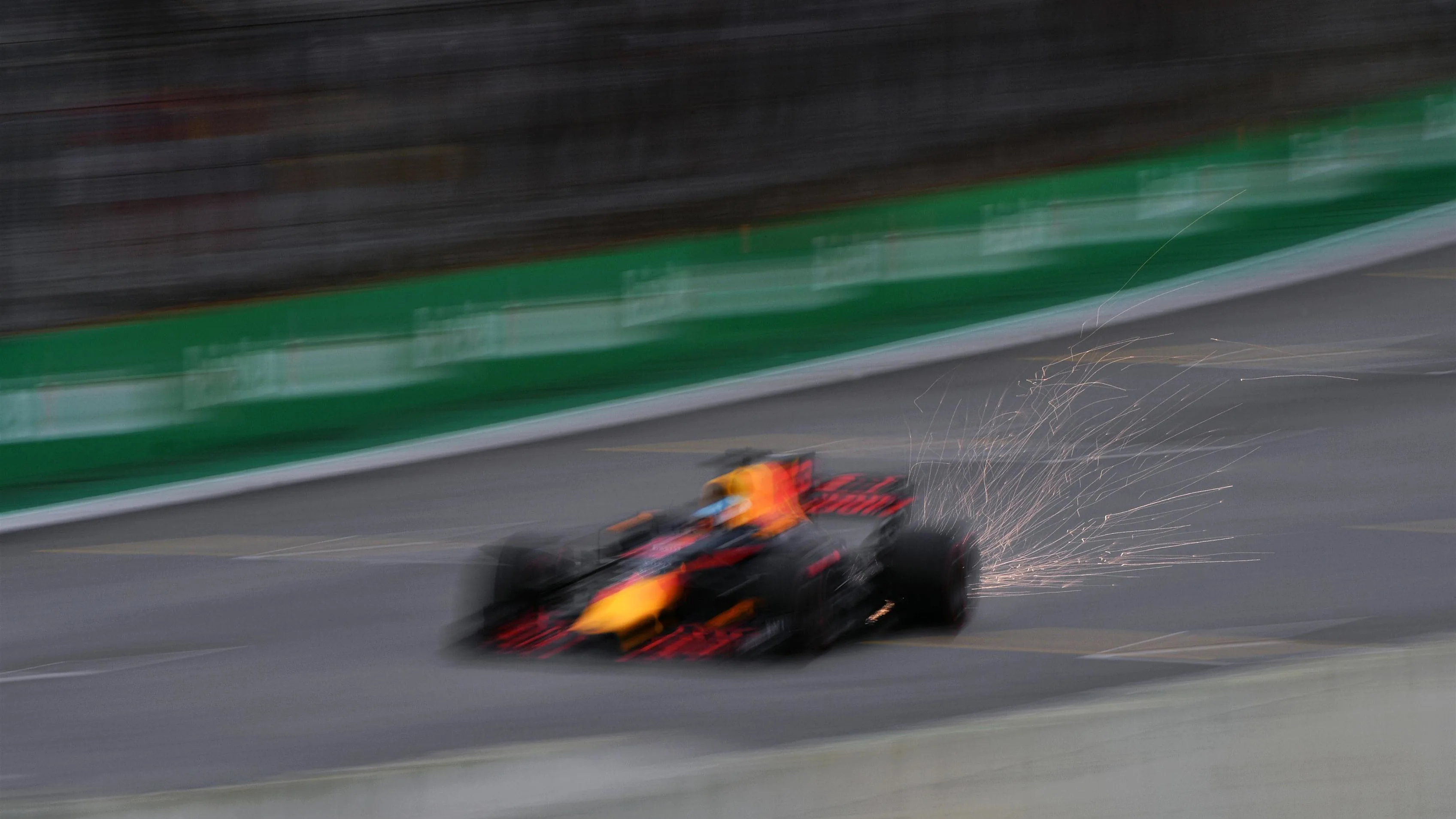 Daniel Ricciardo (AUS) Red Bull Racing RB13 sparks at Formula One World Championship, Rd19, Brazilian Grand Prix, Qualifying, Interlagos, Sao Paulo, Brazil, Saturday 11 November 2017. © Mark Sutton/Sutton Images
