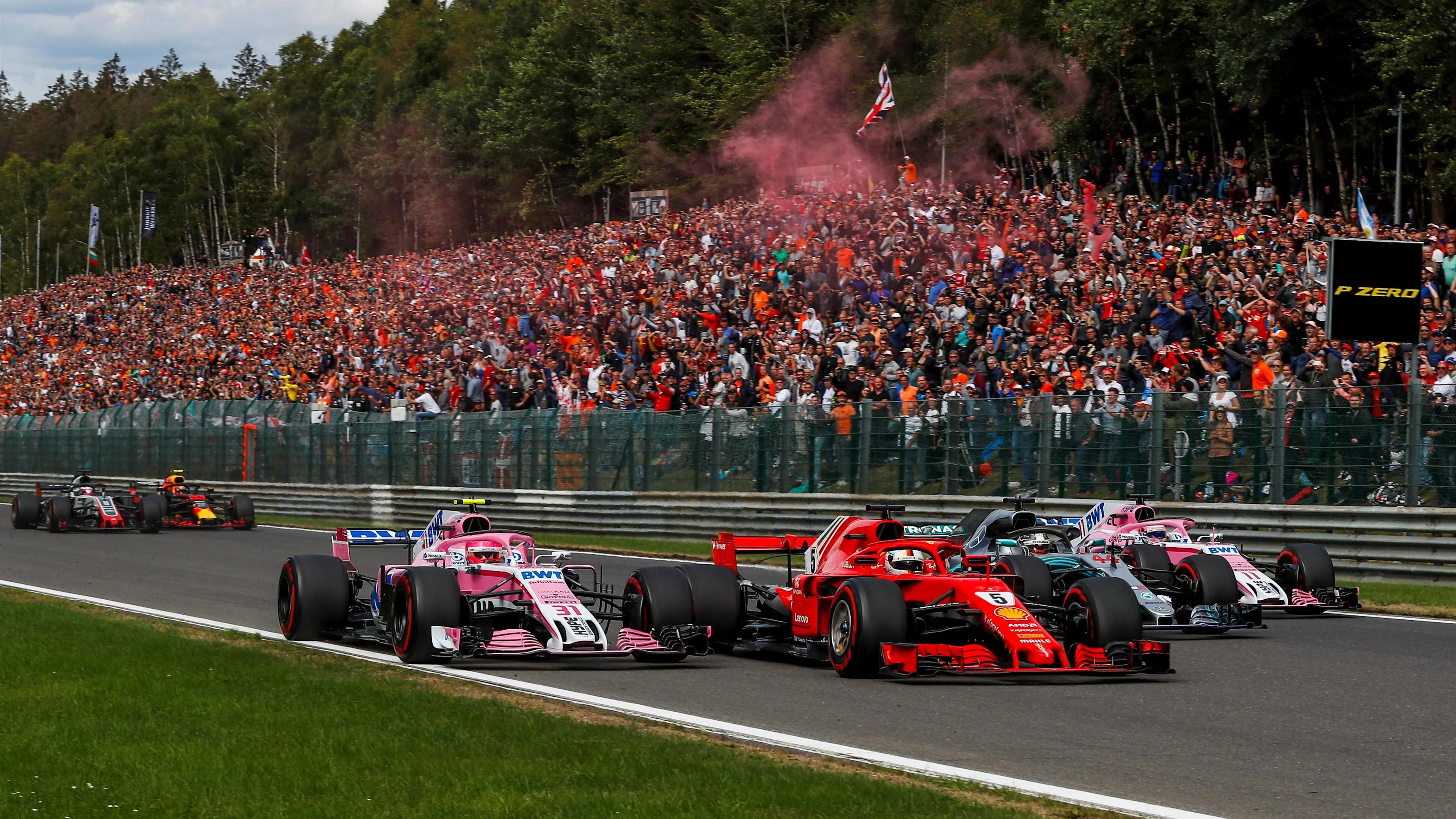 Esteban Ocon, Racing Point Force India VJM11, Sebastian Vettel, Ferrari SF71H, Lewis Hamilton, Mercedes AMG F1 W09 and Sergio Perez, Racing Point Force India VJM11 battle on lap one at Formula One World Championship, Rd13, Belgian Grand Prix, Race, Spa Francorchamps, Belgium, Sunday 26 August 2018. © Manuel Goria/Sutton Images