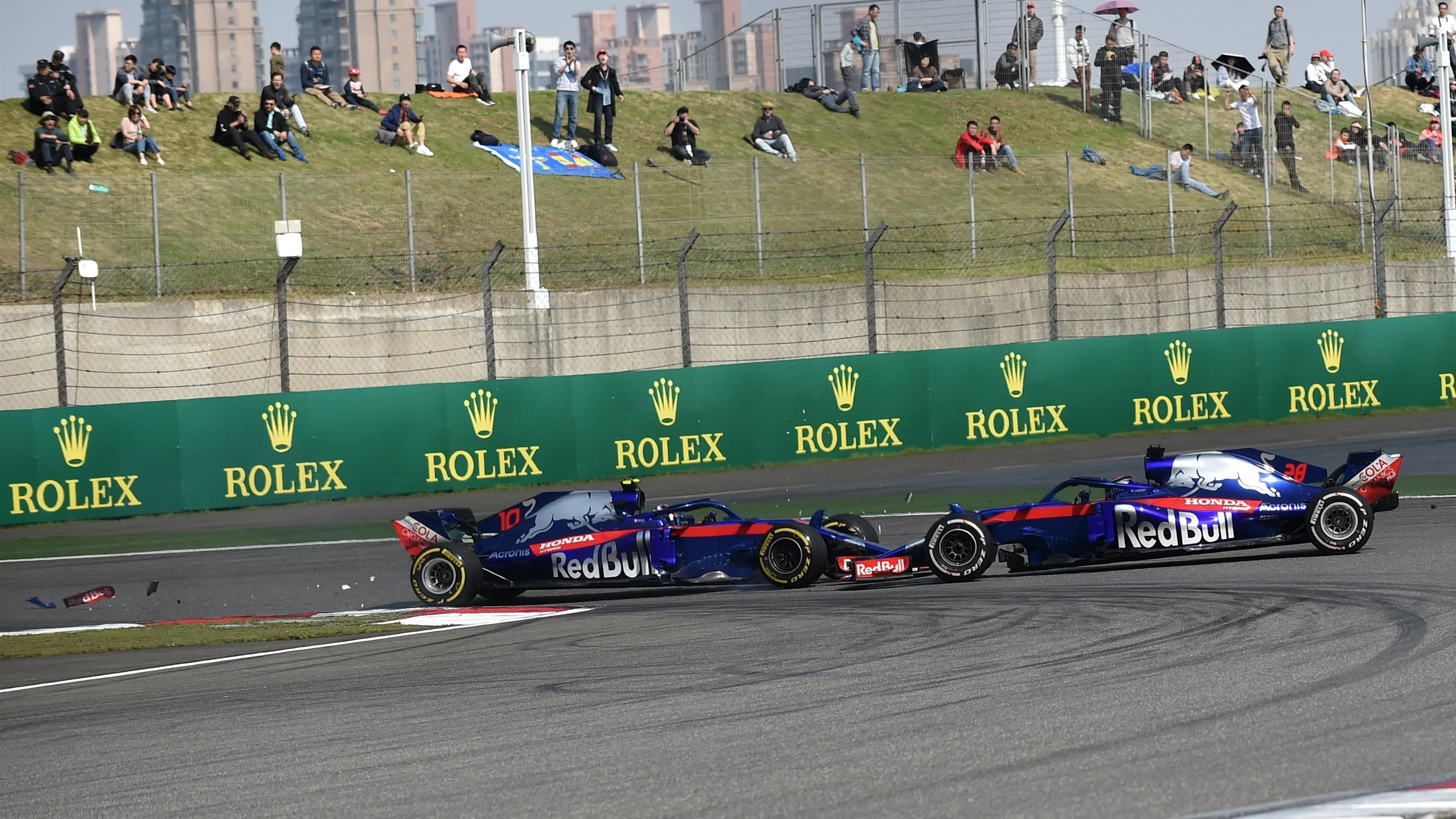 Pierre Gasly (FRA) Scuderia Toro Rosso STR13 and Brendon Hartley (NZL) Scuderia Toro Rosso STR13 collide at Formula One World Championship, Rd3, Chinese Grand Prix, Race, Shanghai, China, Sunday 15 April 2018. © Simon Galloway/Sutton Images