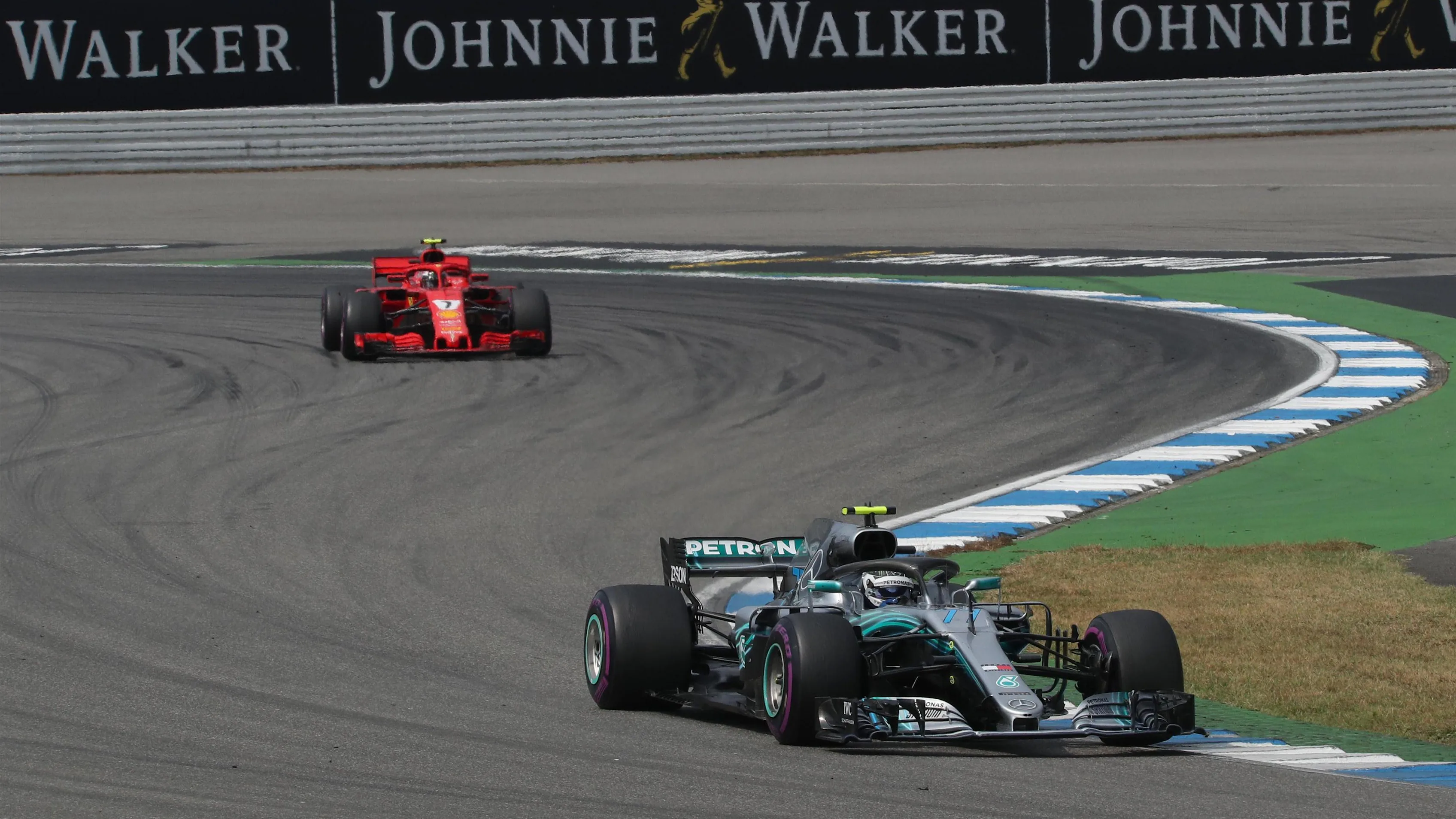 Valtteri Bottas (FIN) Mercedes-AMG F1 W09 EQ Power+ and Kimi Raikkonen (FIN) Ferrari SF-71H at