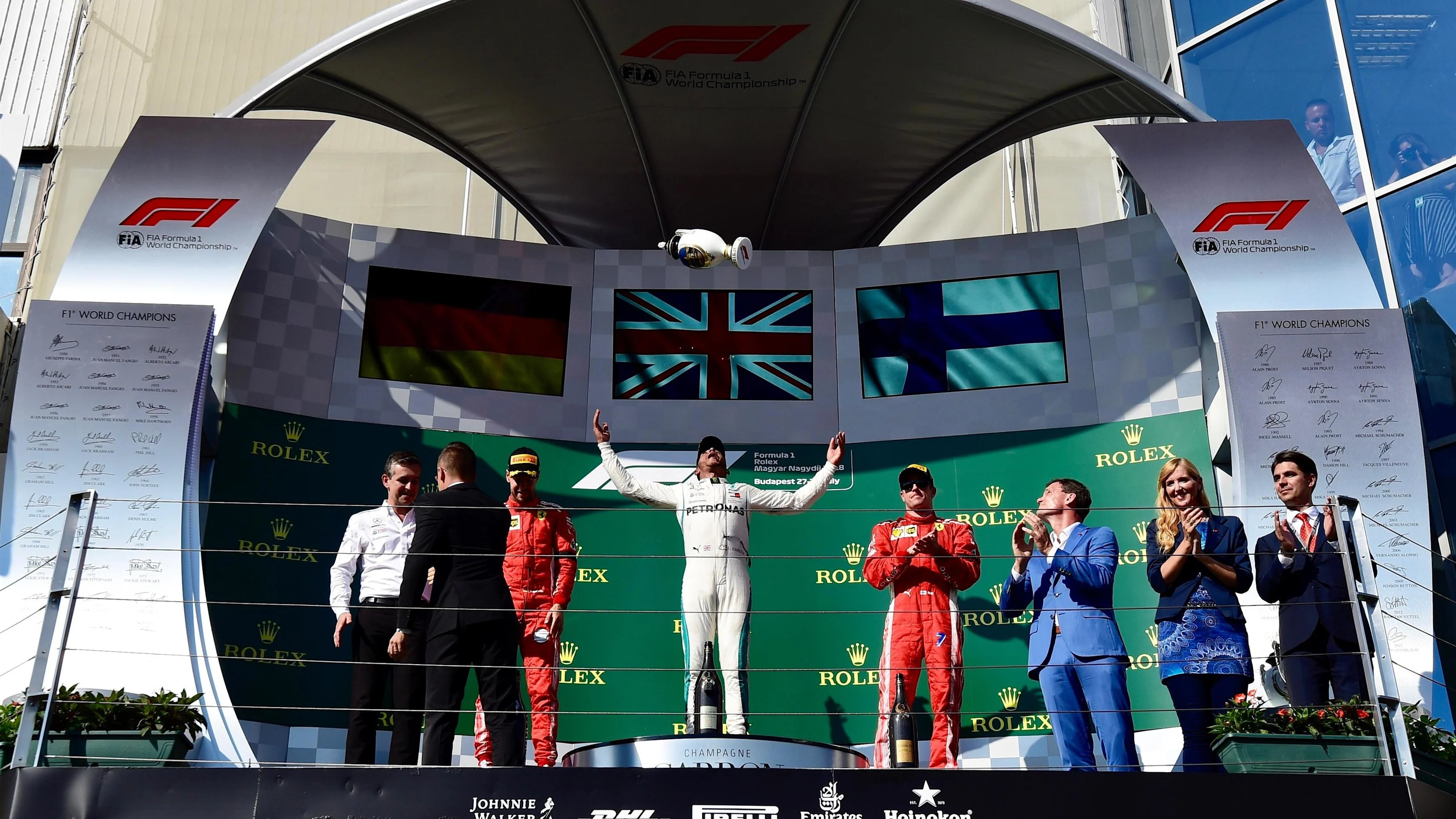 Sebastian Vettel (GER) Ferrari, Lewis Hamilton (GBR) Mercedes-AMG F1 and Kimi Raikkonen (FIN)