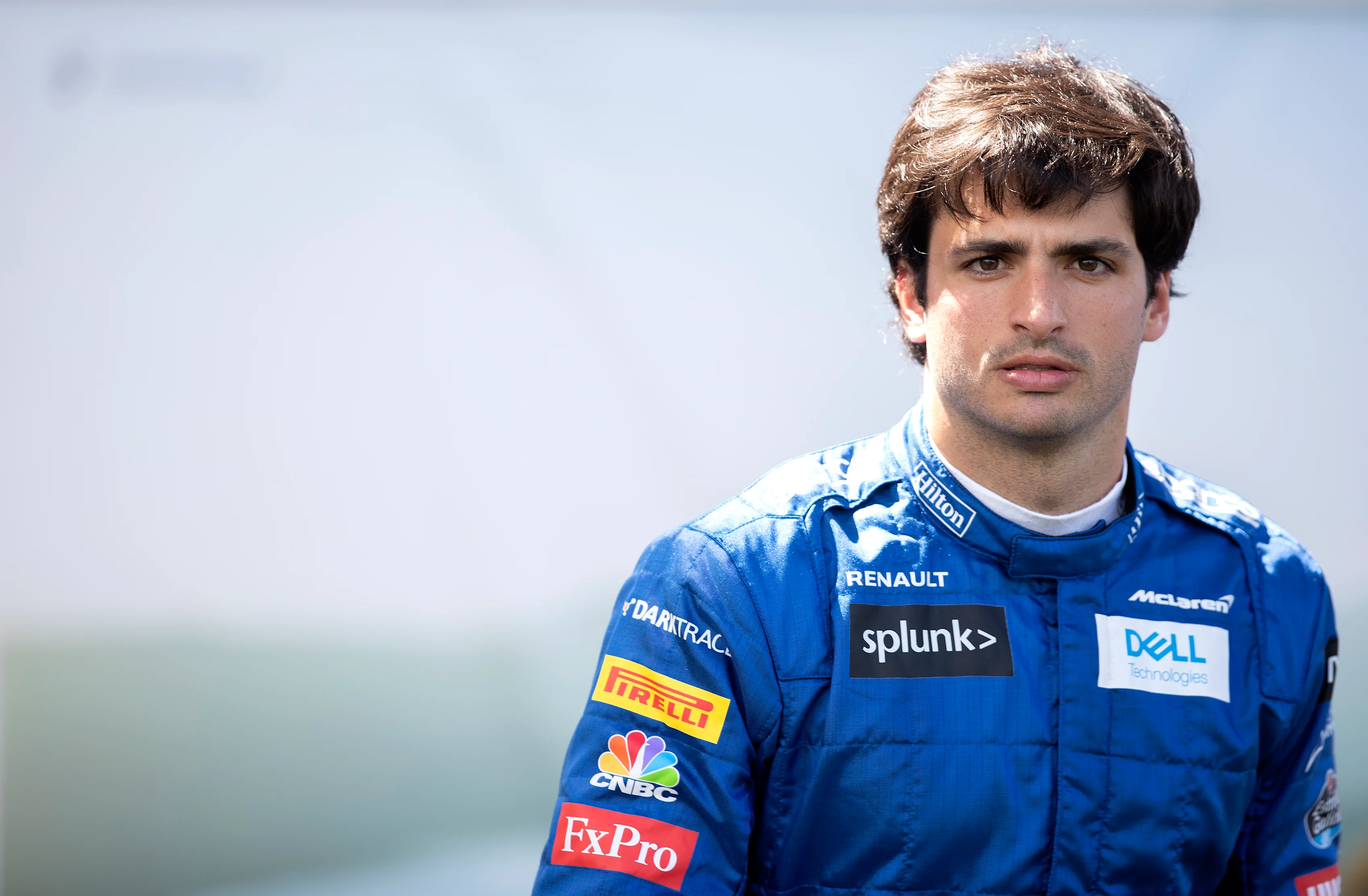 MELBOURNE, AUSTRALIA - MARCH 12: Carlos Sainz of Spain and McLaren F1 looks on in the Paddock during previews ahead of the F1 Grand Prix of Australia at Melbourne Grand Prix Circuit on March 12, 2020 in Melbourne, Australia. (Photo by Mark Thompson/Getty Images)