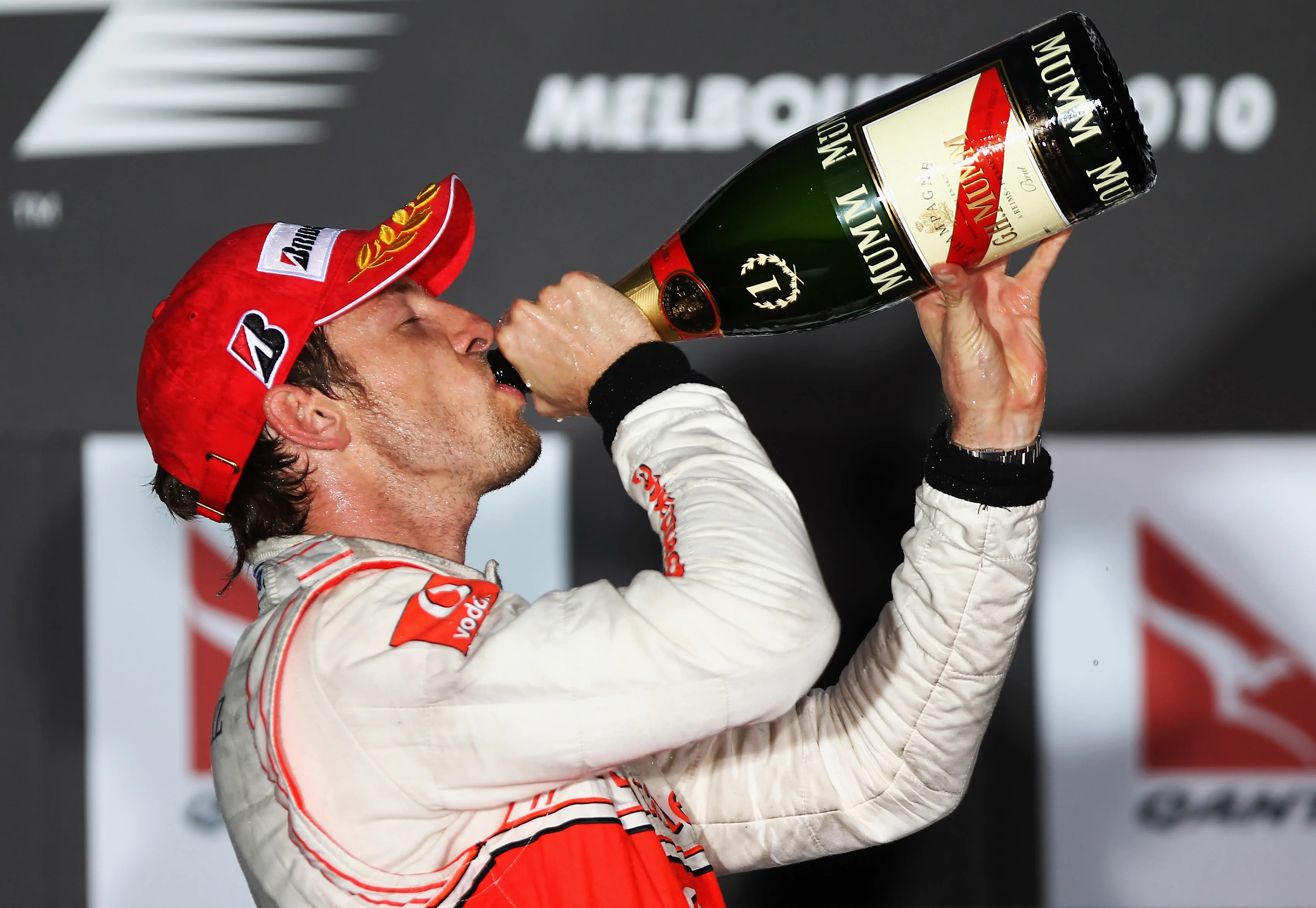 MELBOURNE, AUSTRALIA - MARCH 28: Jenson Button of Great Britain and McLaren Mercedes celebrates on